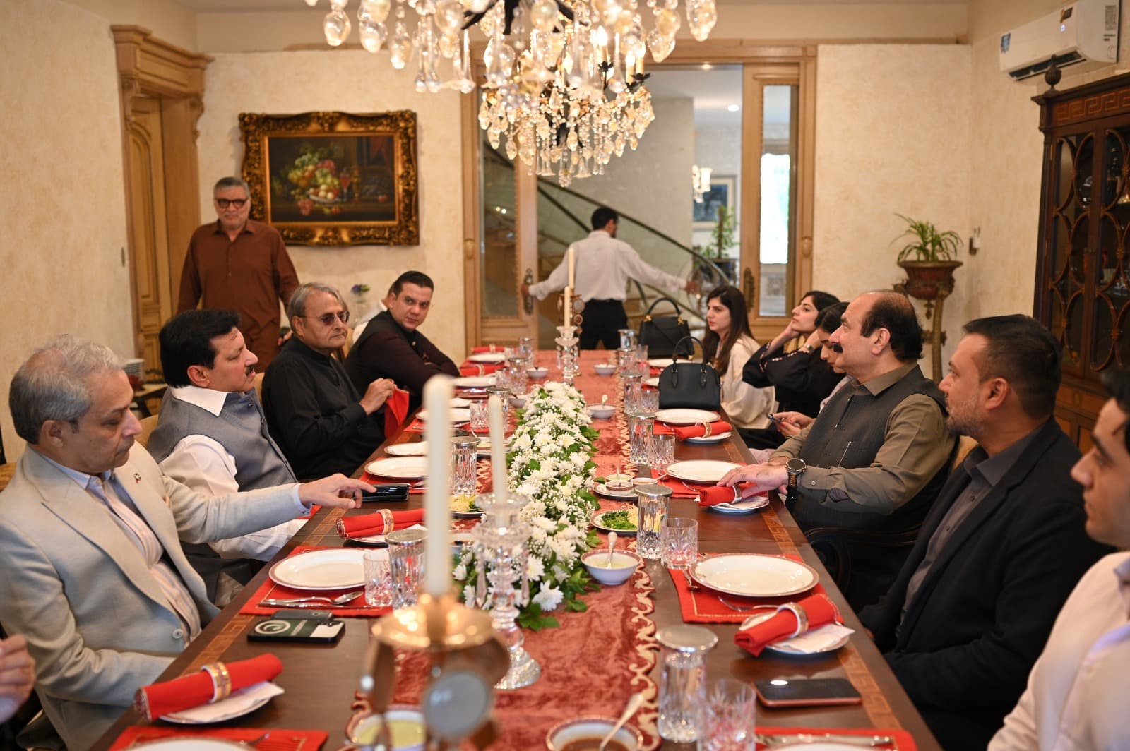 Guests seated at the working lunch hosted at Dewan House
